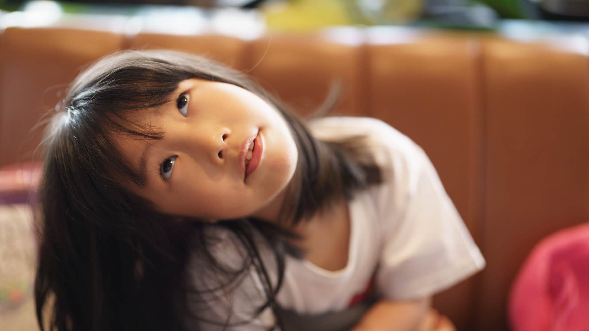 little girl rolling her eyes after being told her eyes will get stuck
