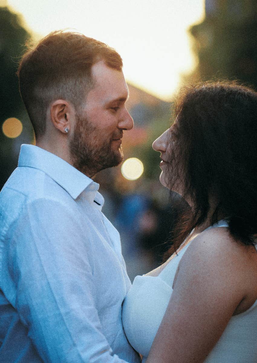 good man compliments woman he loves on her glow