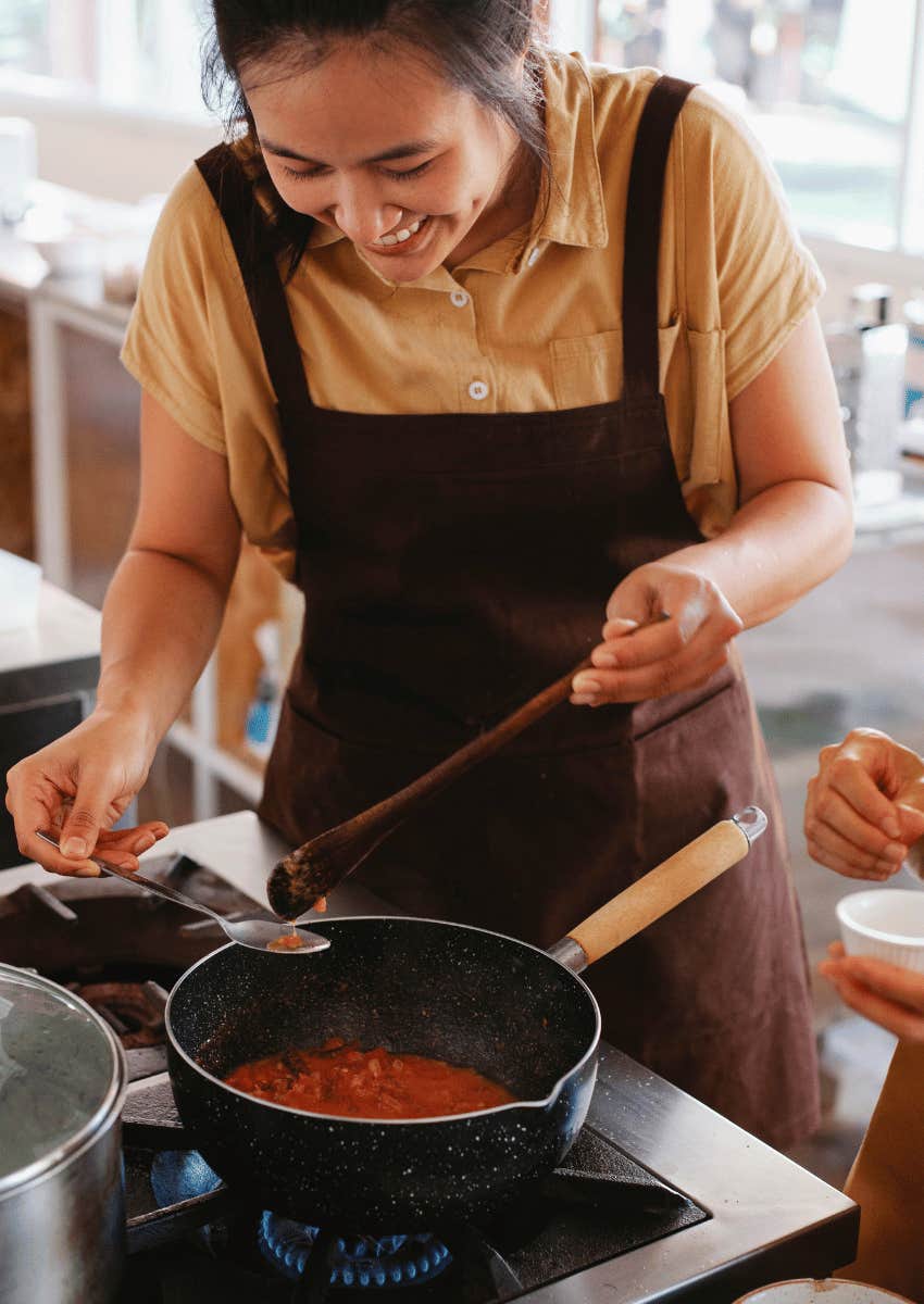 happy woman cooking