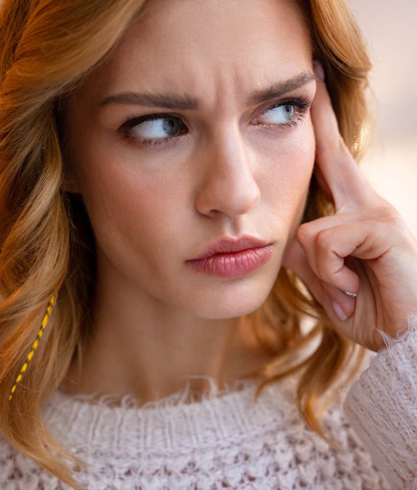 introspective person puts finger to temple showing thoughts make better decisions
