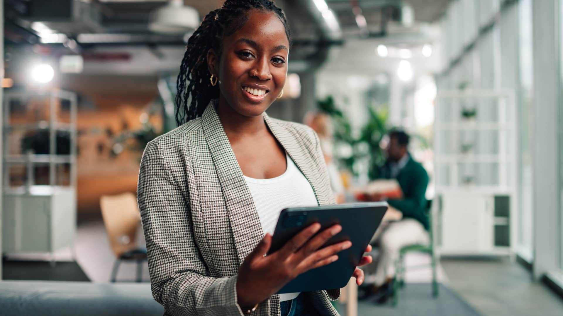 humble high iq woman smiling at work