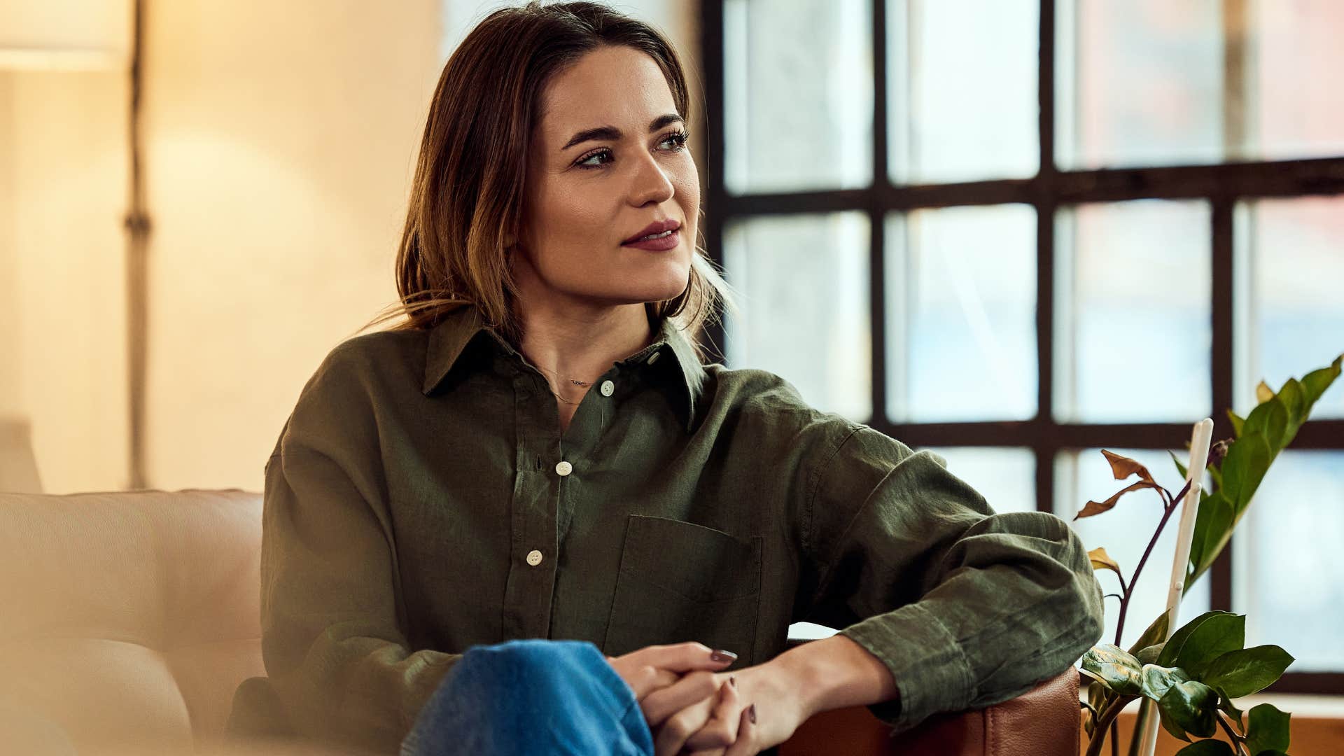 high iq woman who leans on intuition sitting thinking