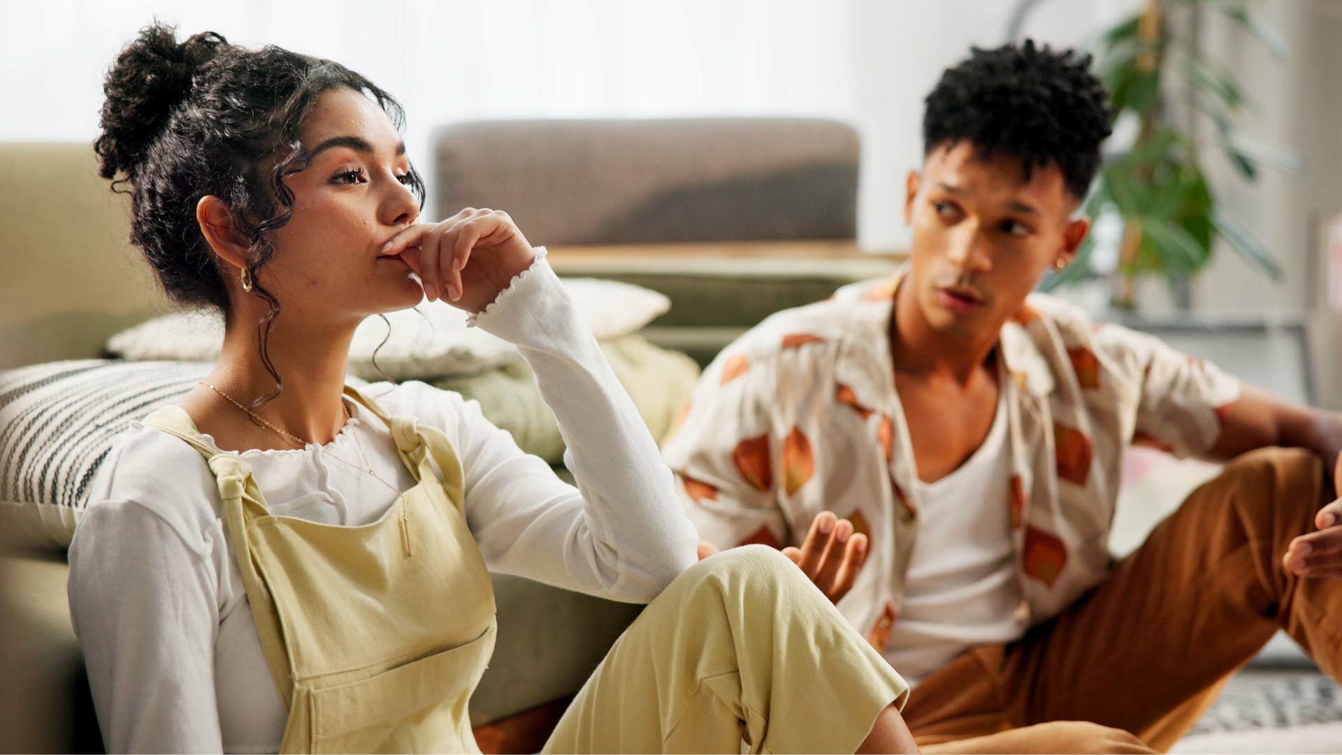 man arguing with woman as he says here we go again