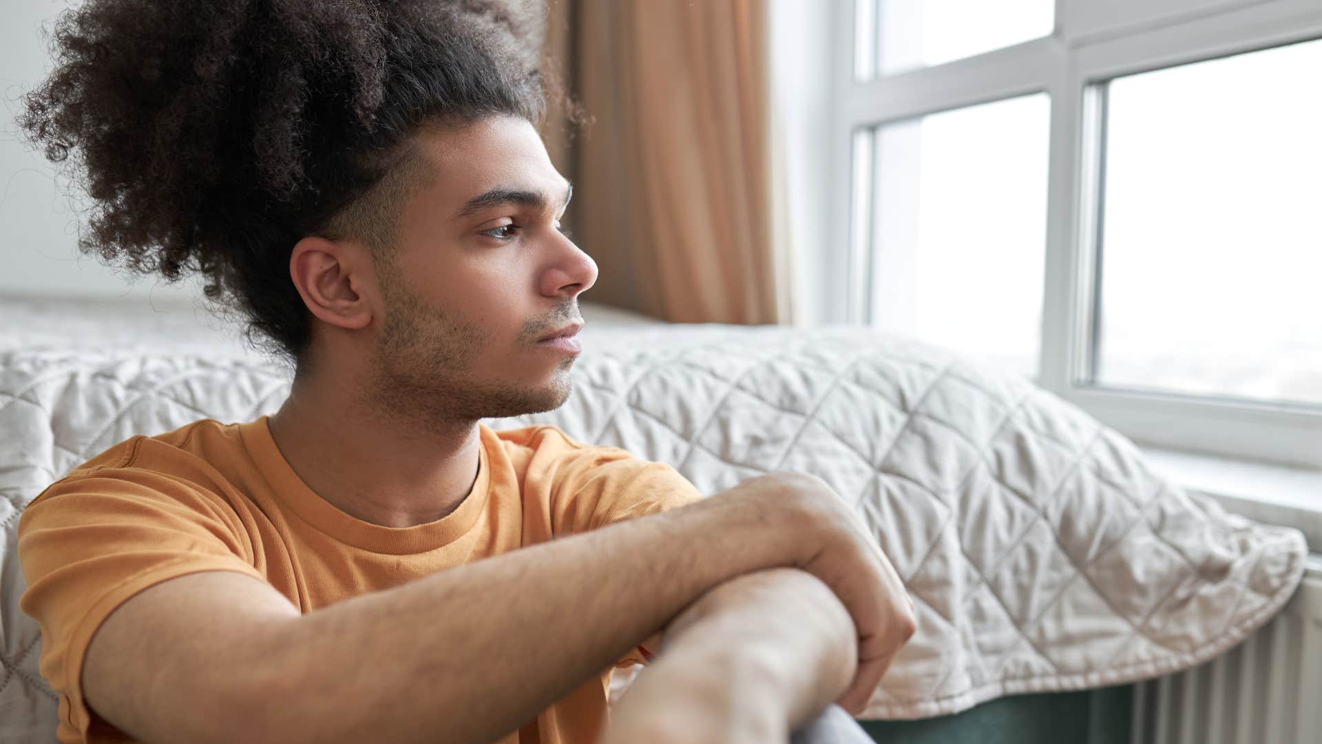 lonely man avoiding celebrating accomplishments