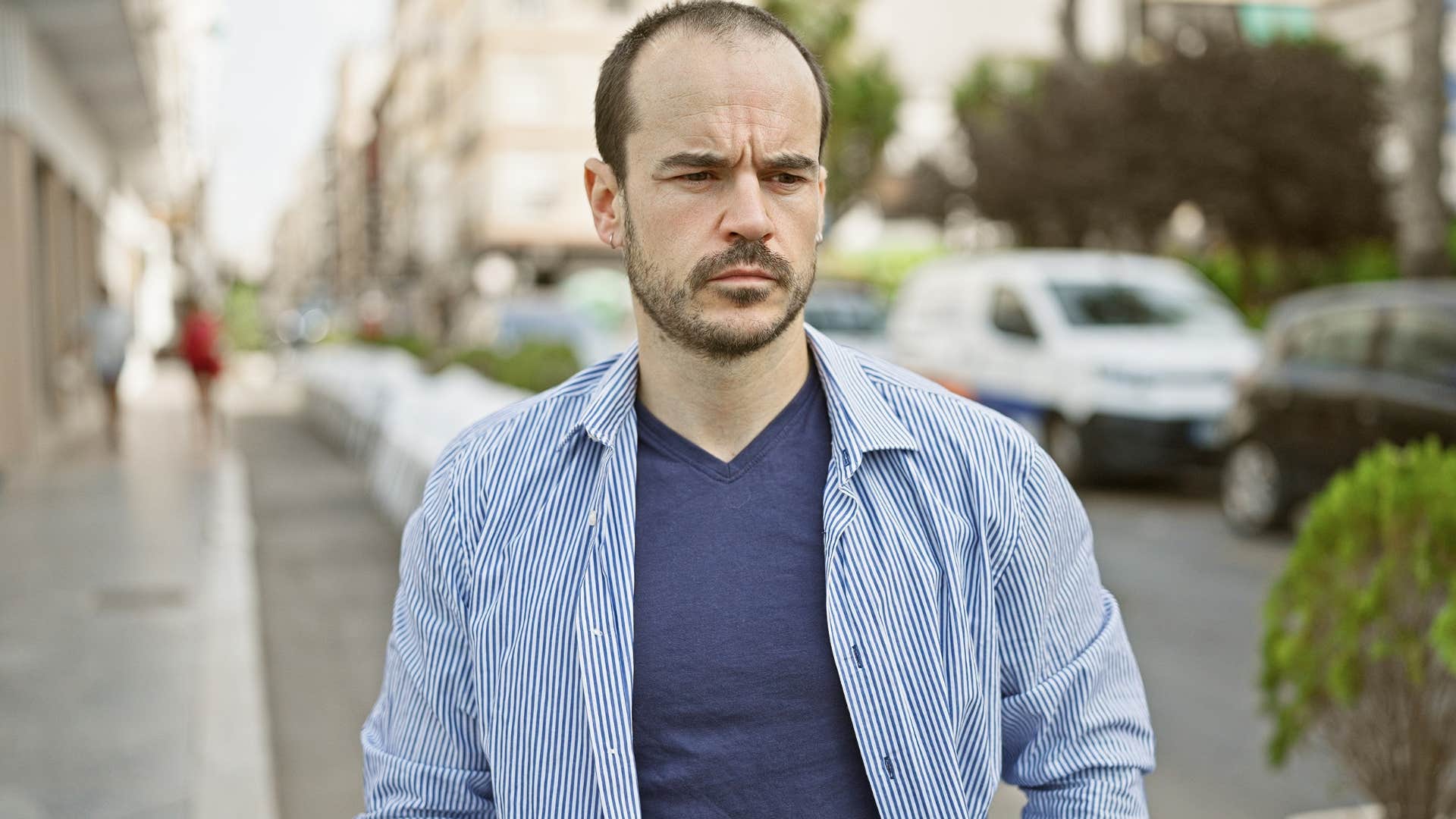 man who's become overly independent walking alone