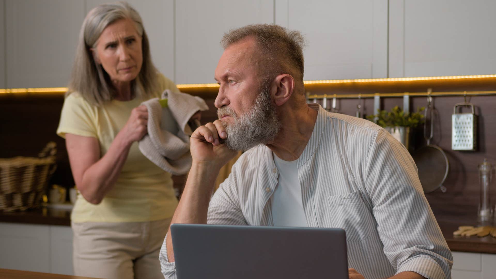 selfish man saying I work hard so I deserve this to stressed wife