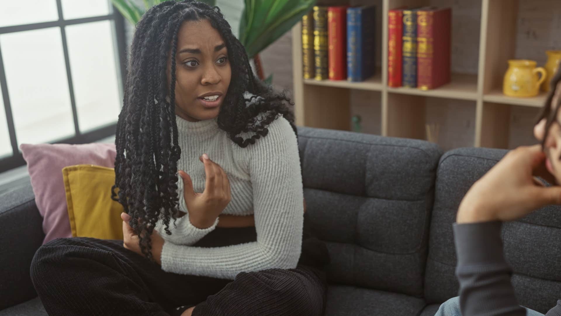 woman over-apologizing for talking to her partner