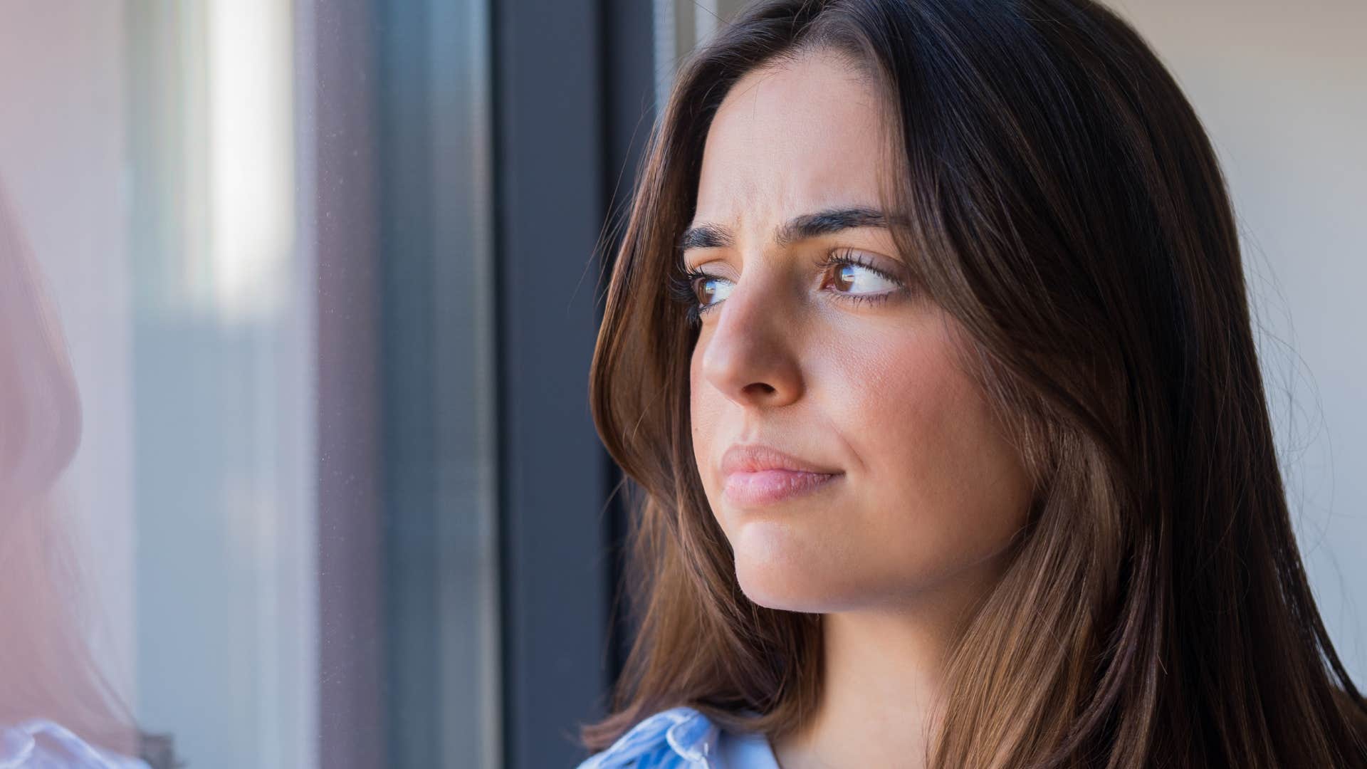 woman rehearsing and replaying conversations in her head