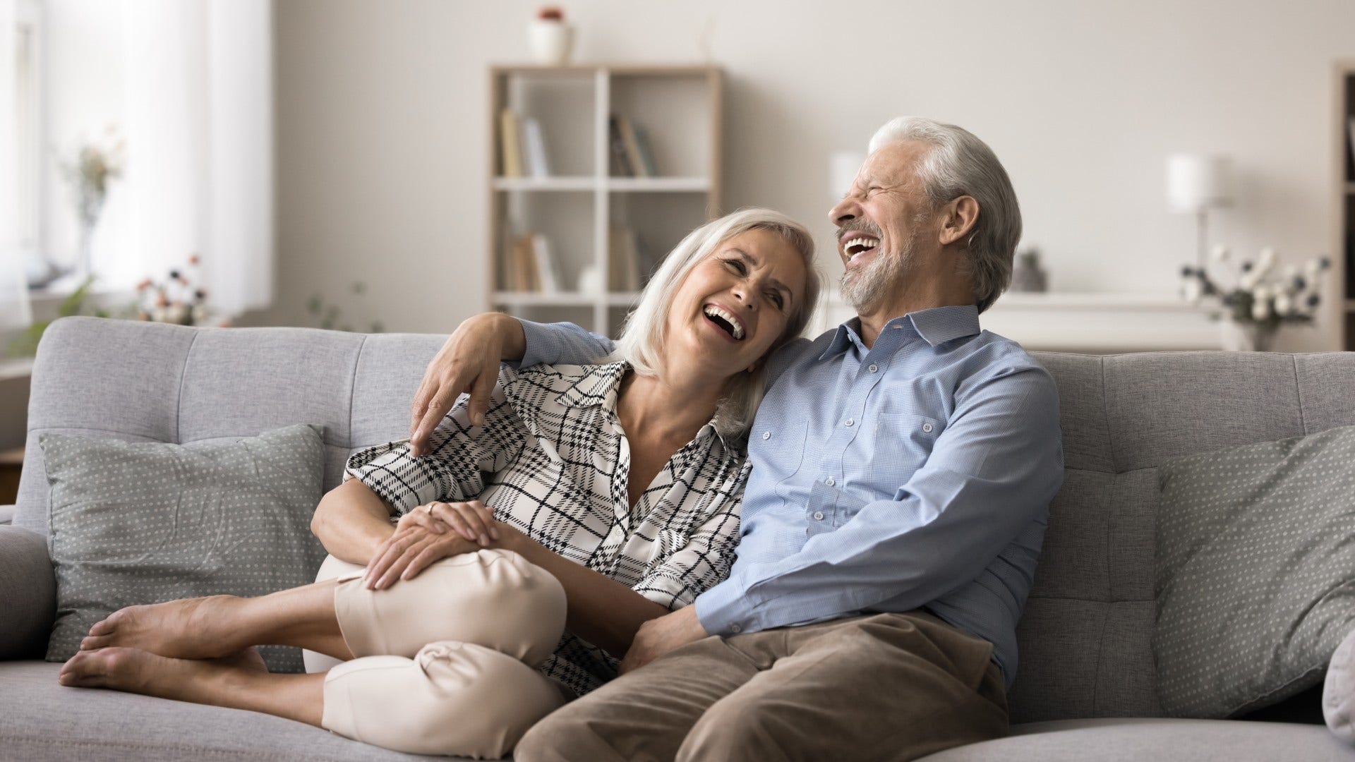 couple who is probably solid laughing about aging-related changes