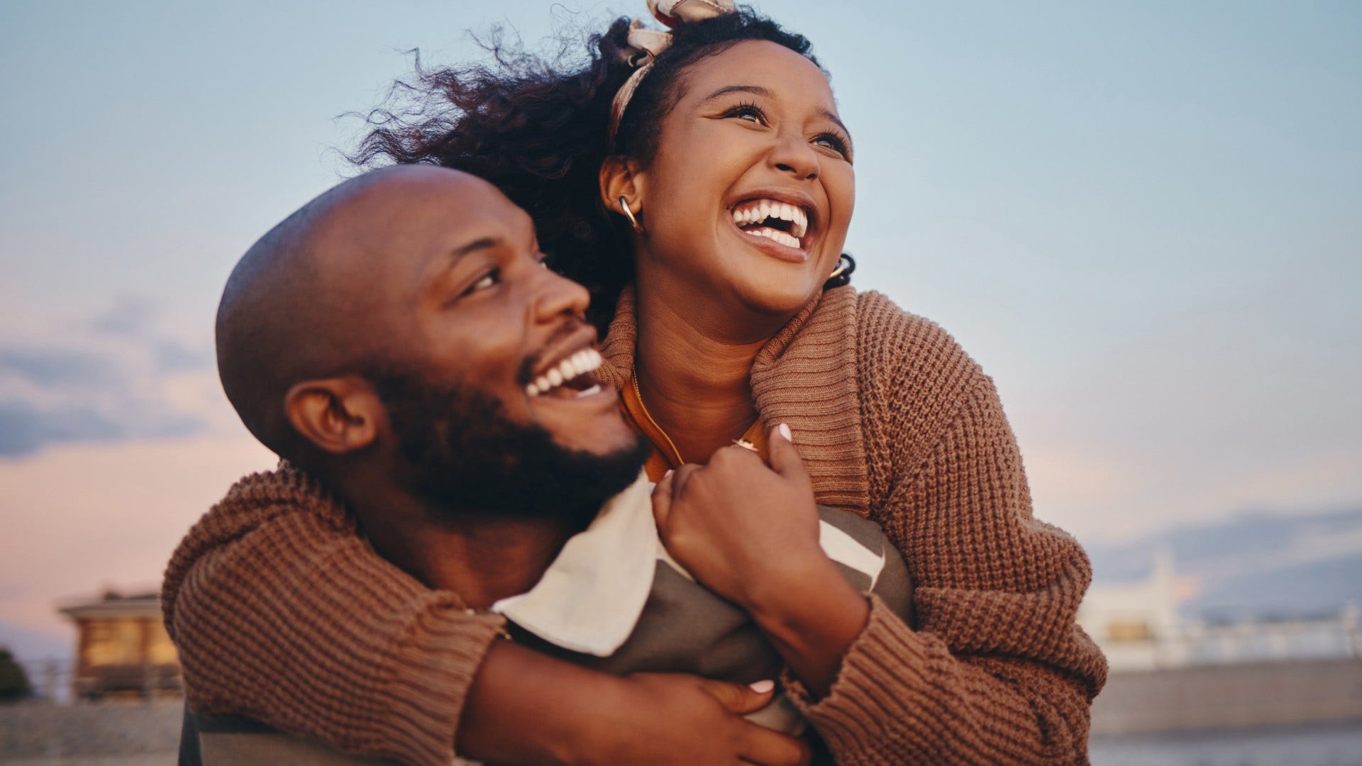 couple who is probably solid laughing about past misunderstandings