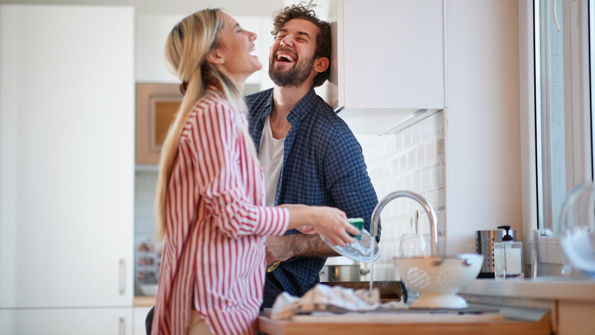 couple who is probably solid laughing about the small personality quirks