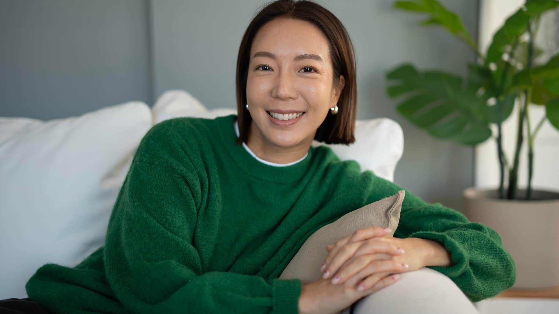 authentic woman smiling at home