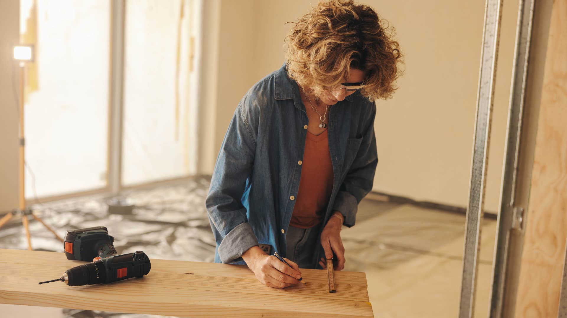 intelligent woman building diy project at home