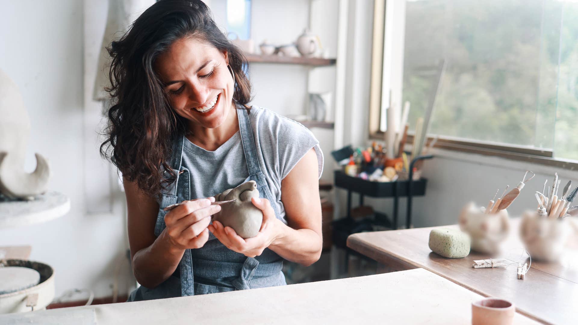 intelligent woman doing pottery
