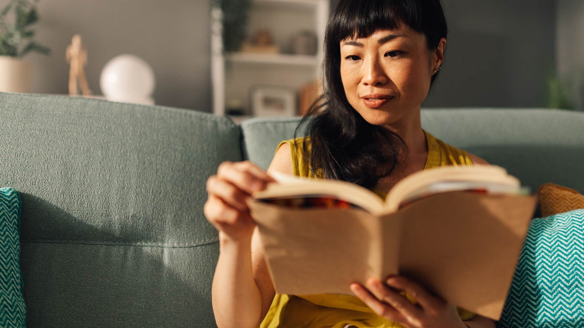 intelligent woman reading complex literature book