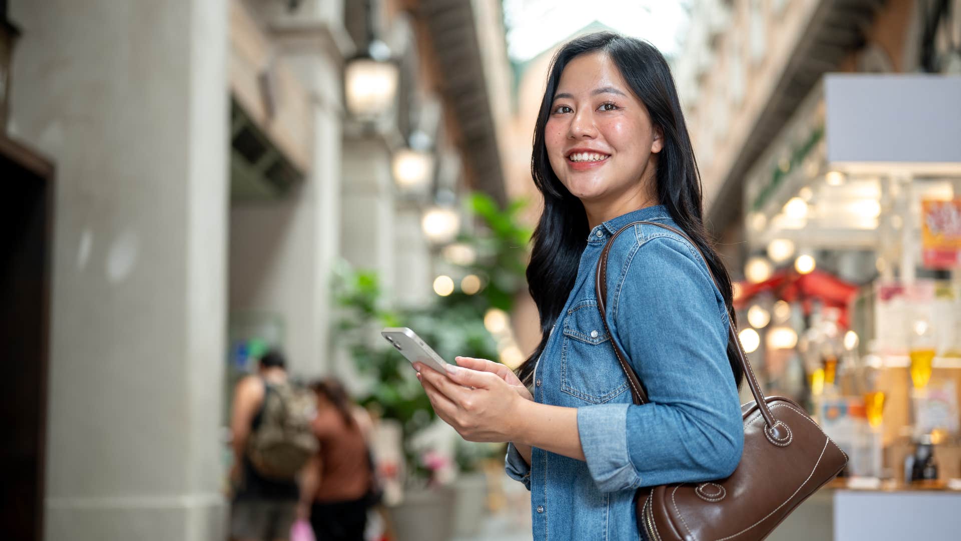 smart woman standing in middle of the street traveling solo