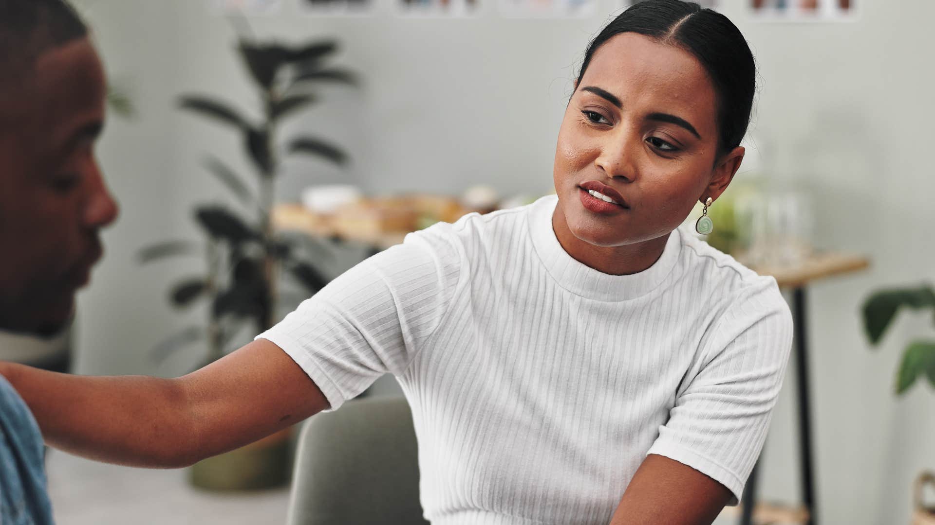 woman who can easily read the room comforting a friend