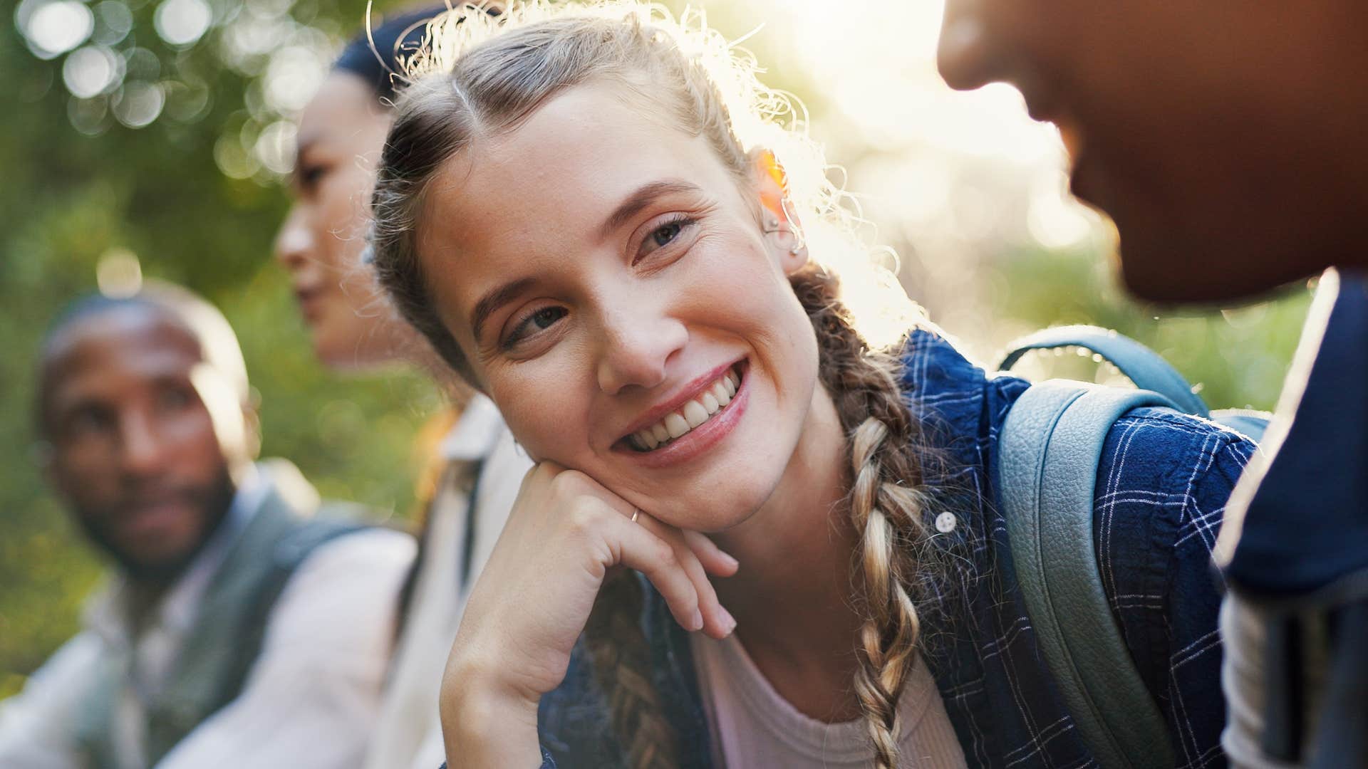 naturally intuitive woman smiling at a friend