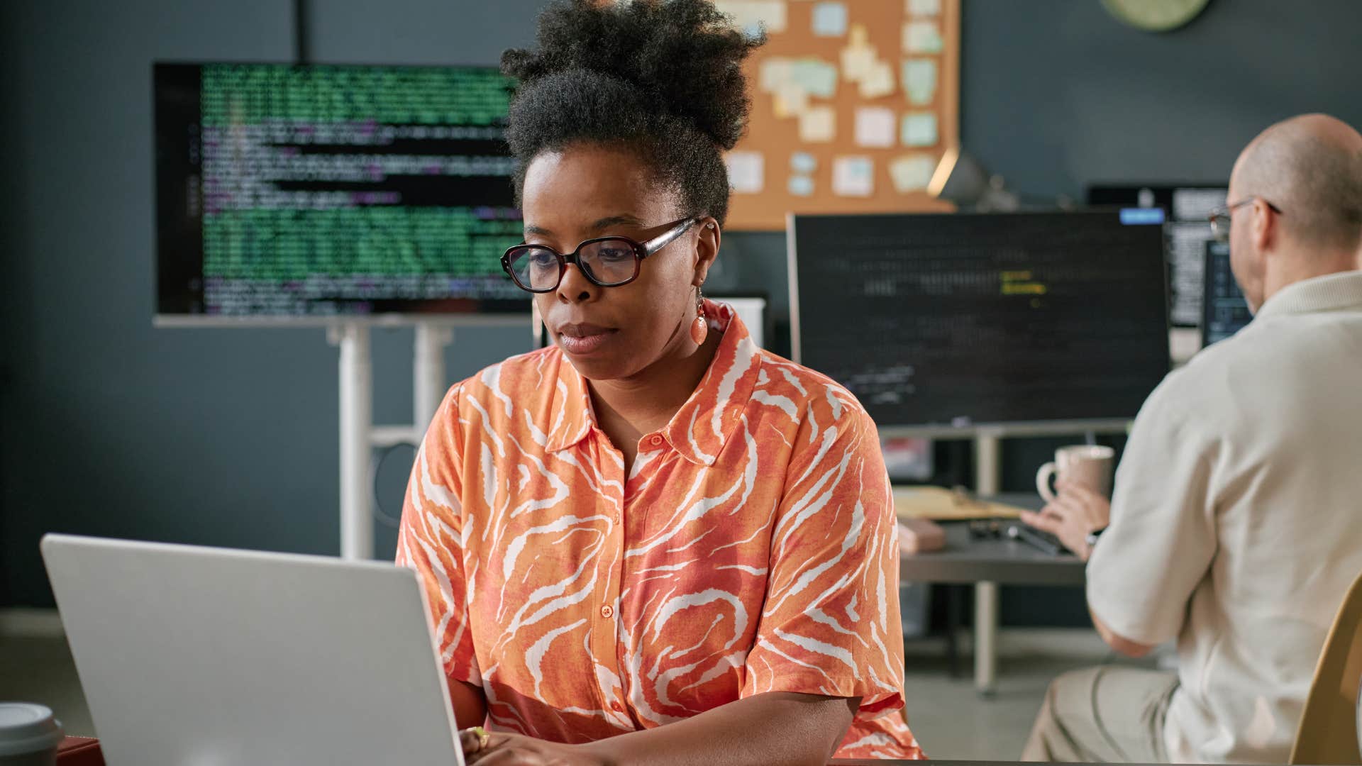 hard-working boomer woman sitting in an office