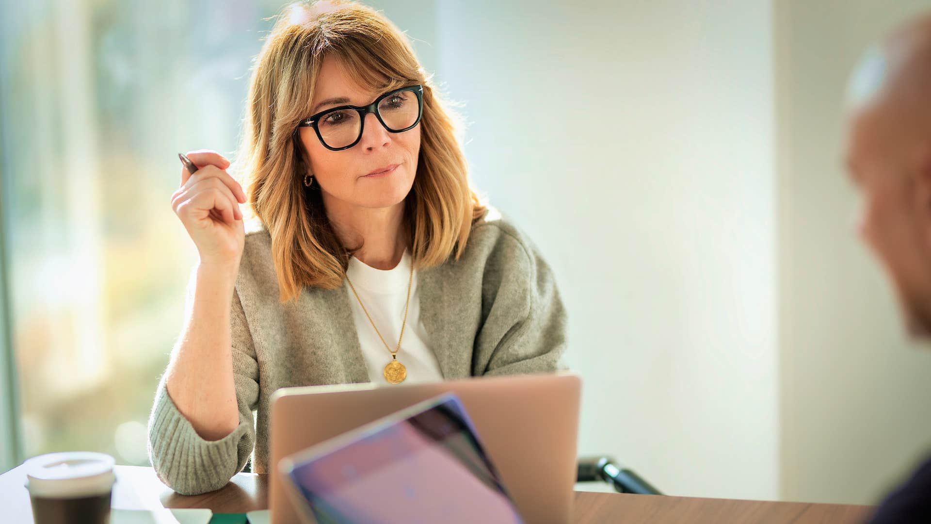 boomer woman who's willing to grow talking at work