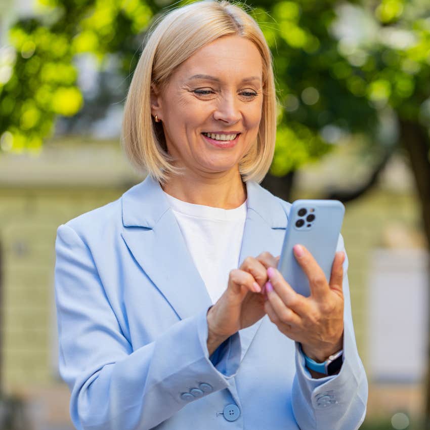Woman who grew up in the 1980s and is comfortable with technology