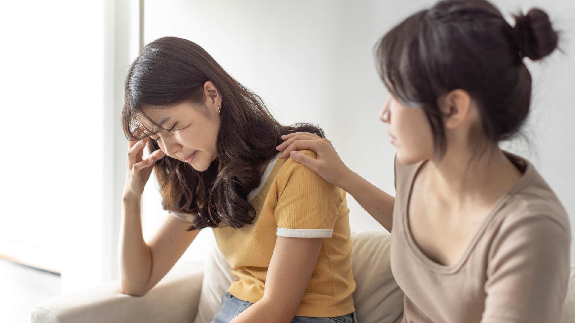 Supportive friend helps sad woman showing loneliness stage