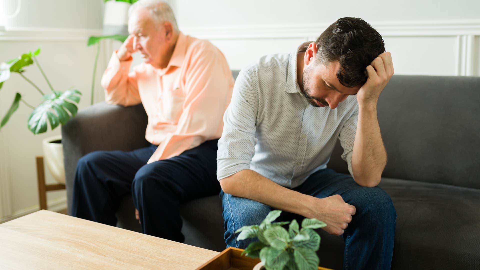 rude man telling concerned sad father I didn't ask to be born
