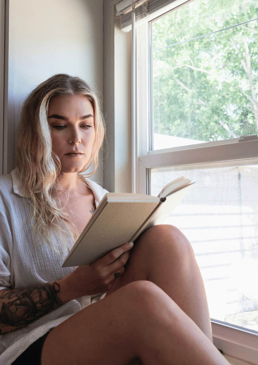 intelligent woman handling being replaced by enjoying reading