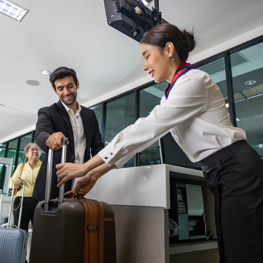 man checking luggage at kansai airport 