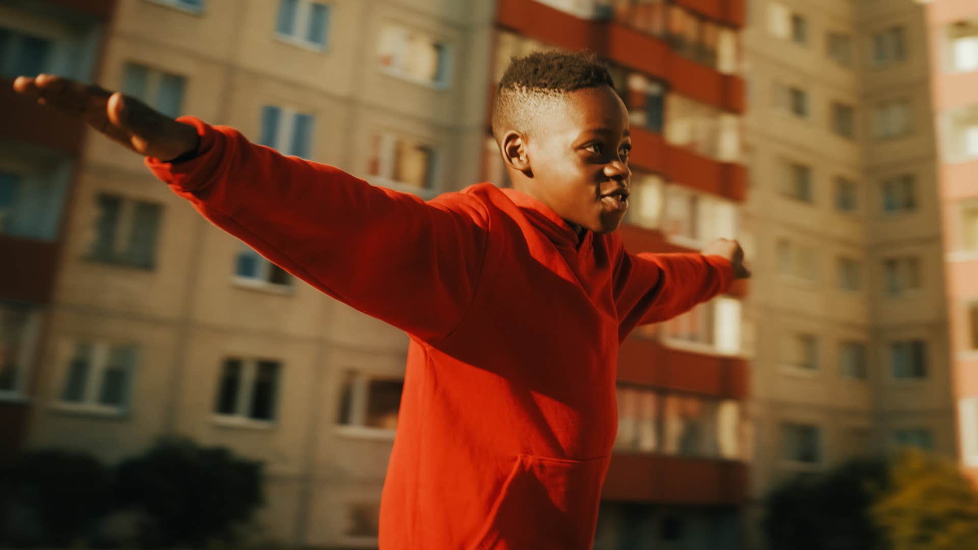 Little boy entertaining themselves without screens.