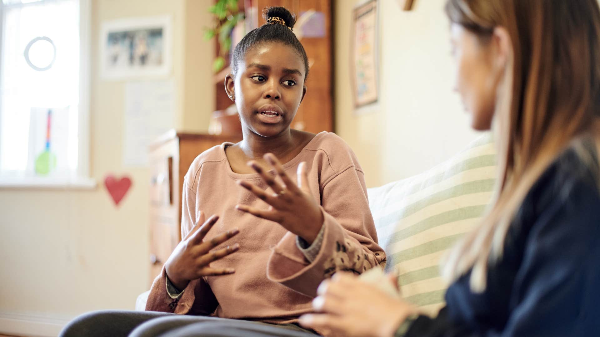 Little girl talking to strangers at school.