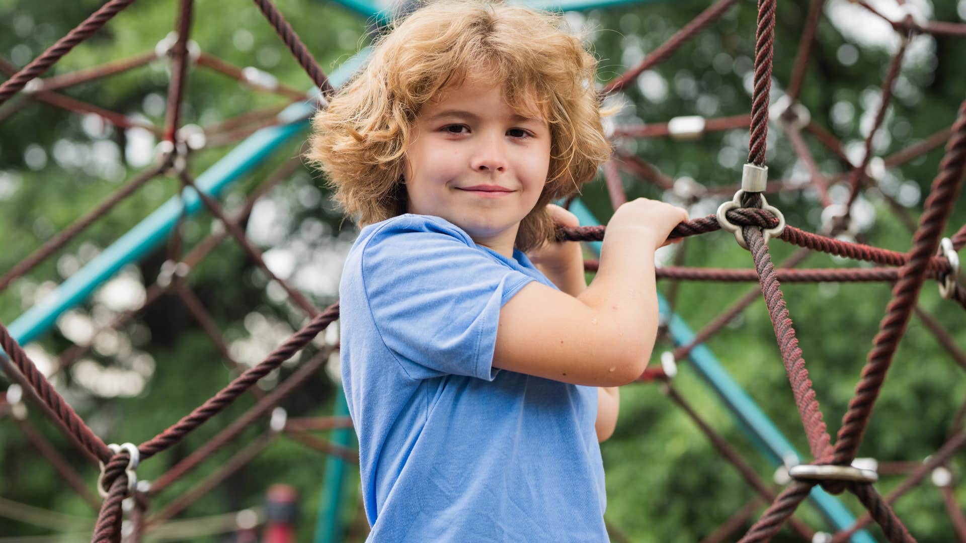 kids entertaining himself outside