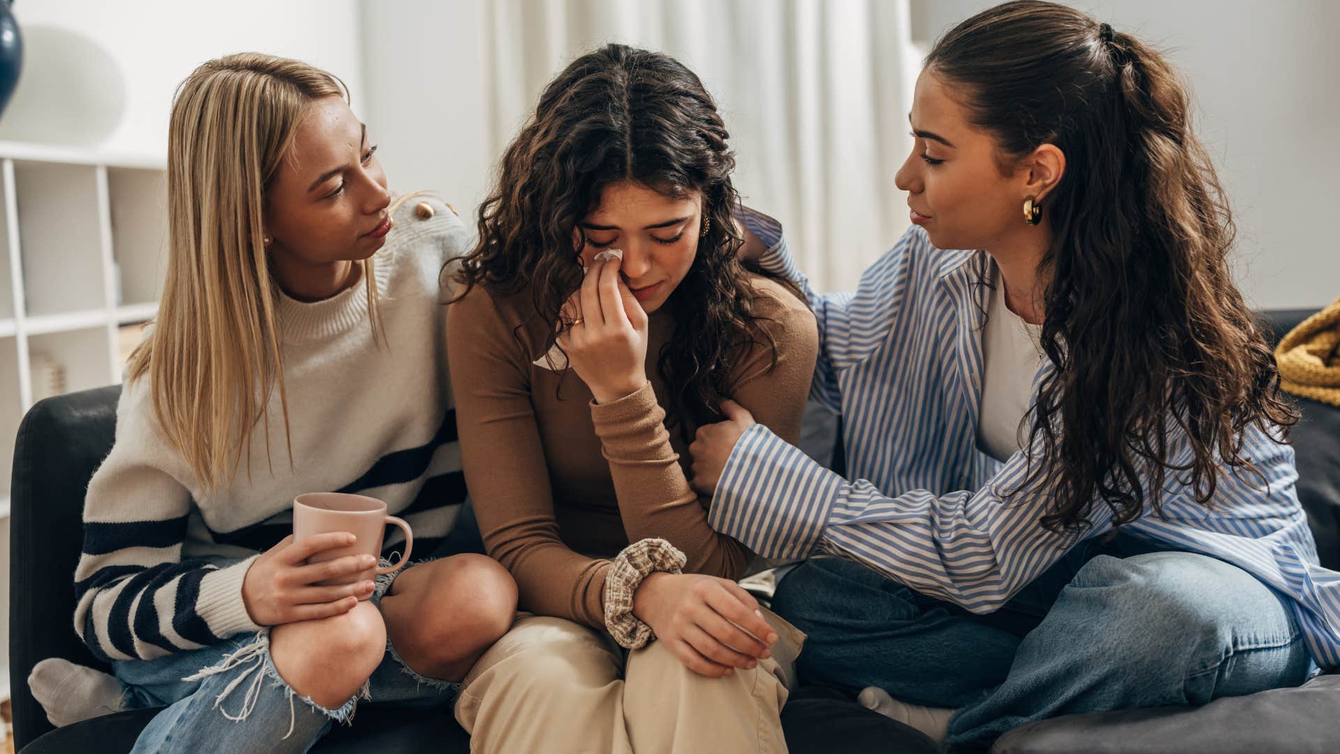 group of women who are supportive of their friend