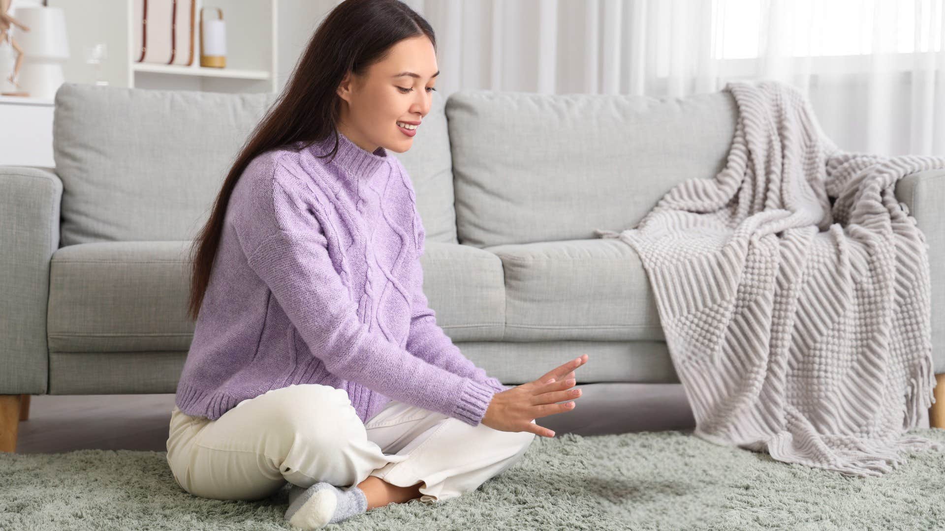 woman trying to figure out what stains on carpet are