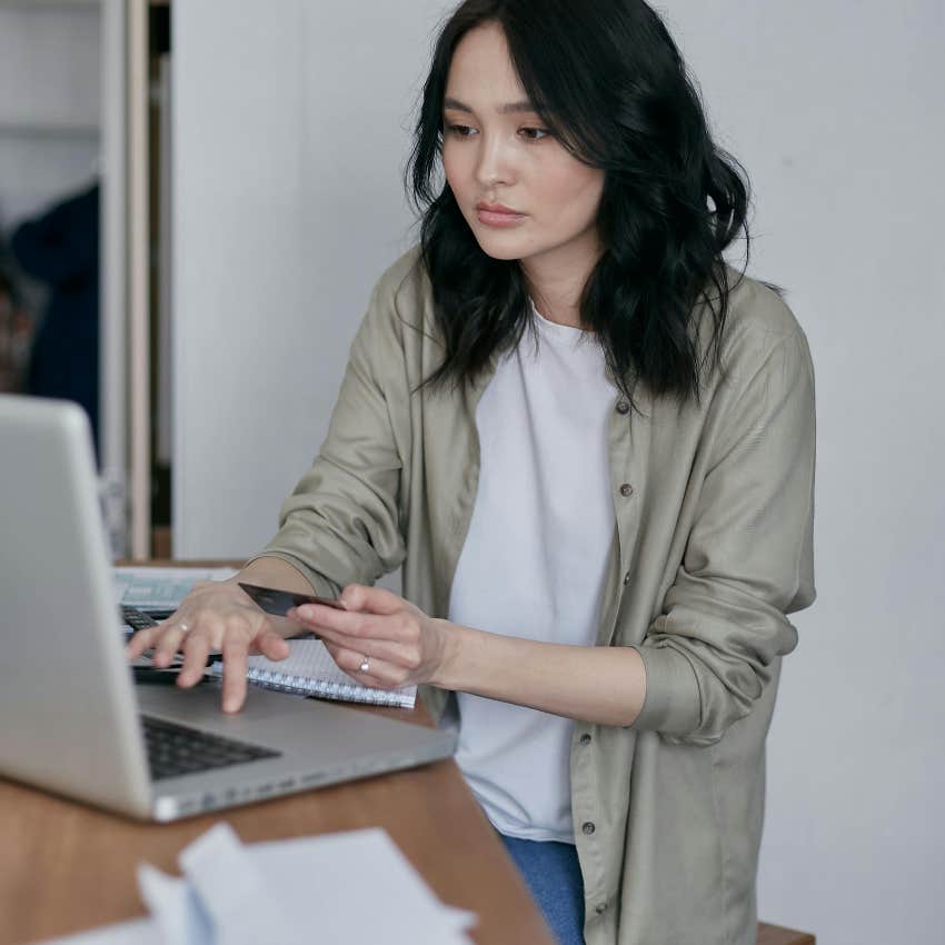 woman paying processing fees