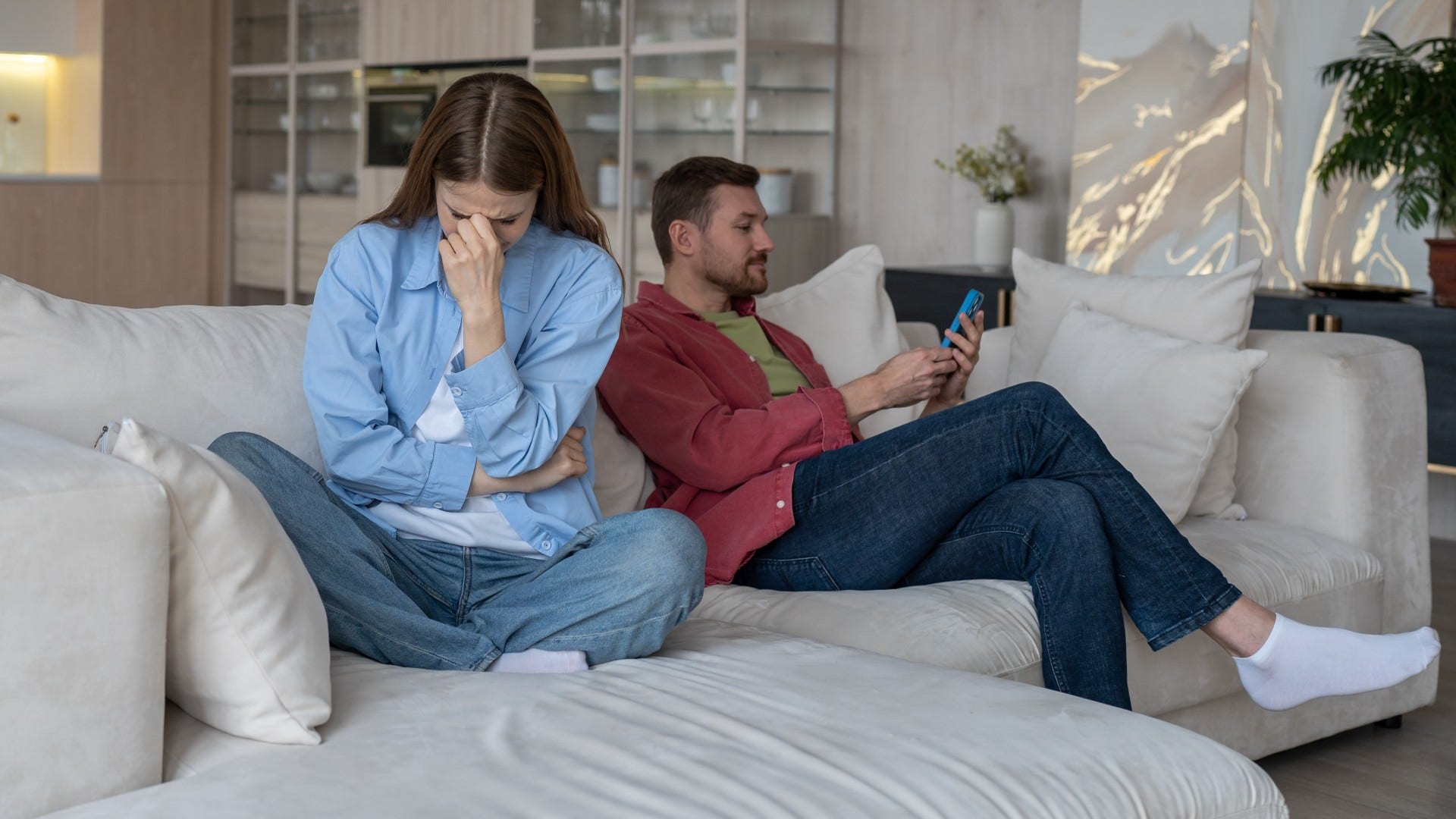 man who feels drained by his relationship and seems distracted