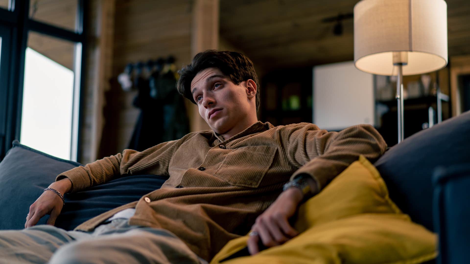 man who is quietly falling out of love spending time alone