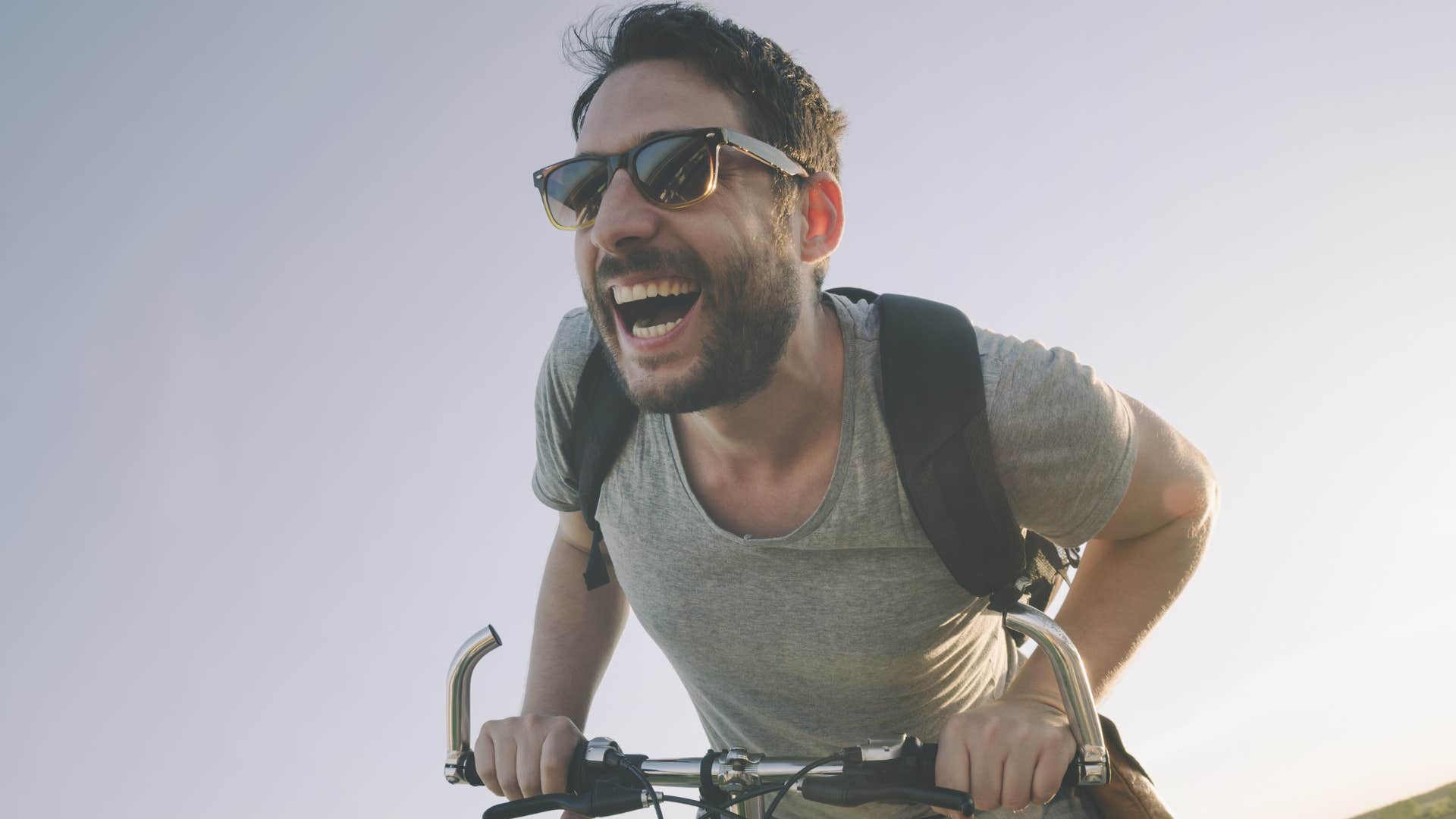 spontaneous man riding his bike having fun