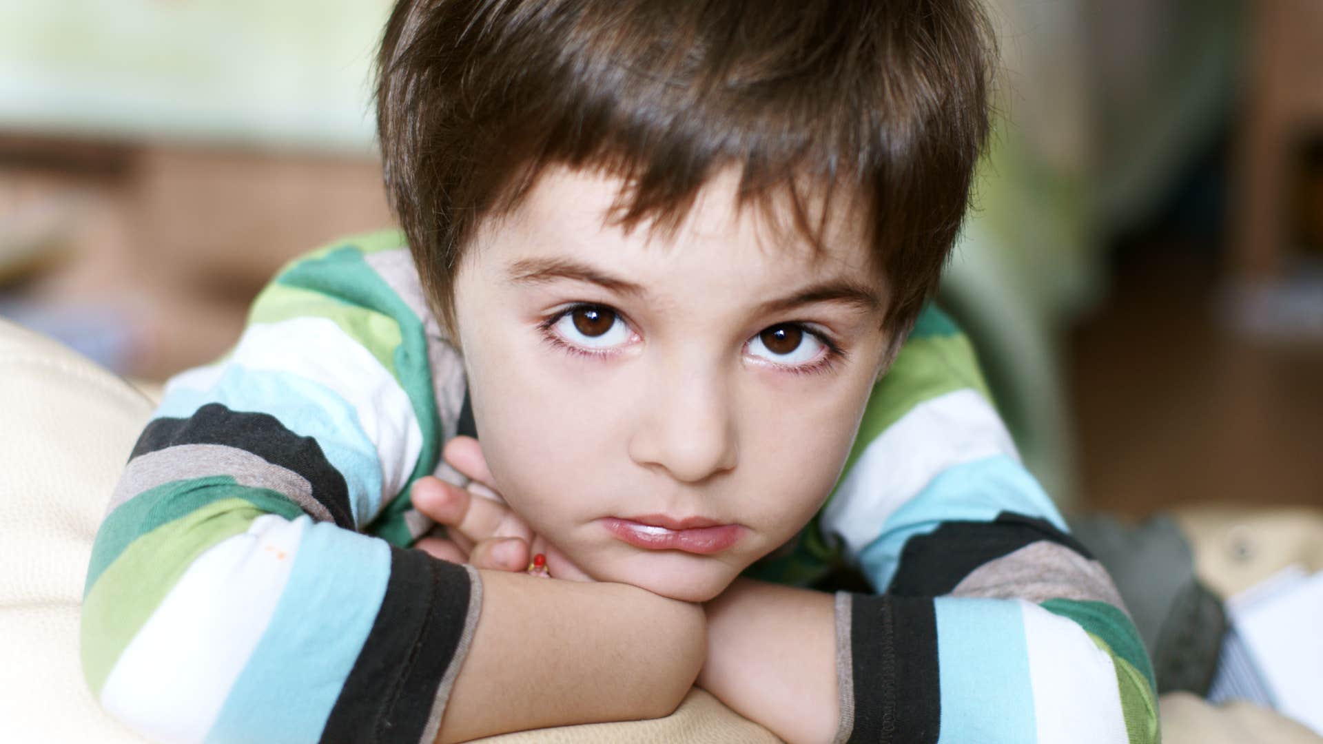 sad little boy whose needs are being minimized and overlooked