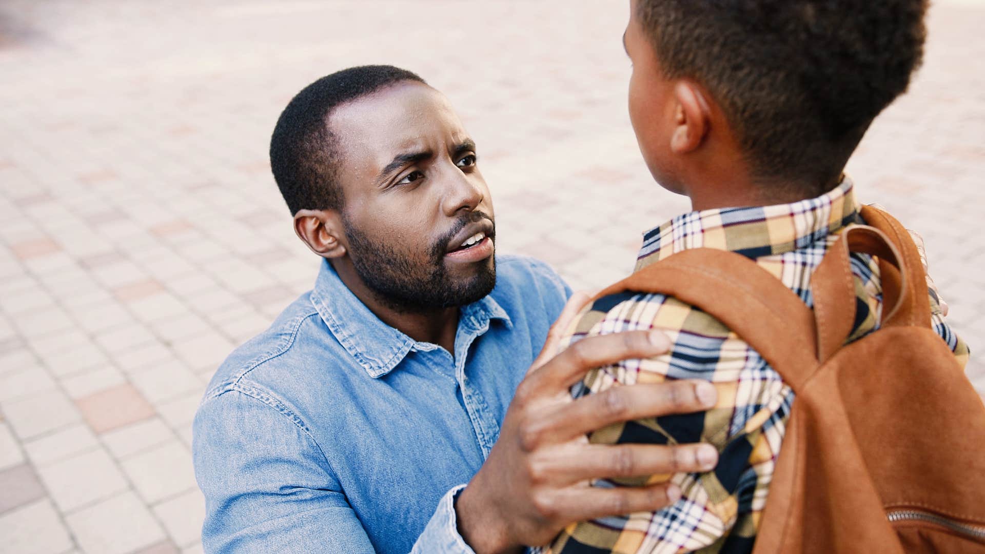 strict father micromanaging young son's schedule yelling at him