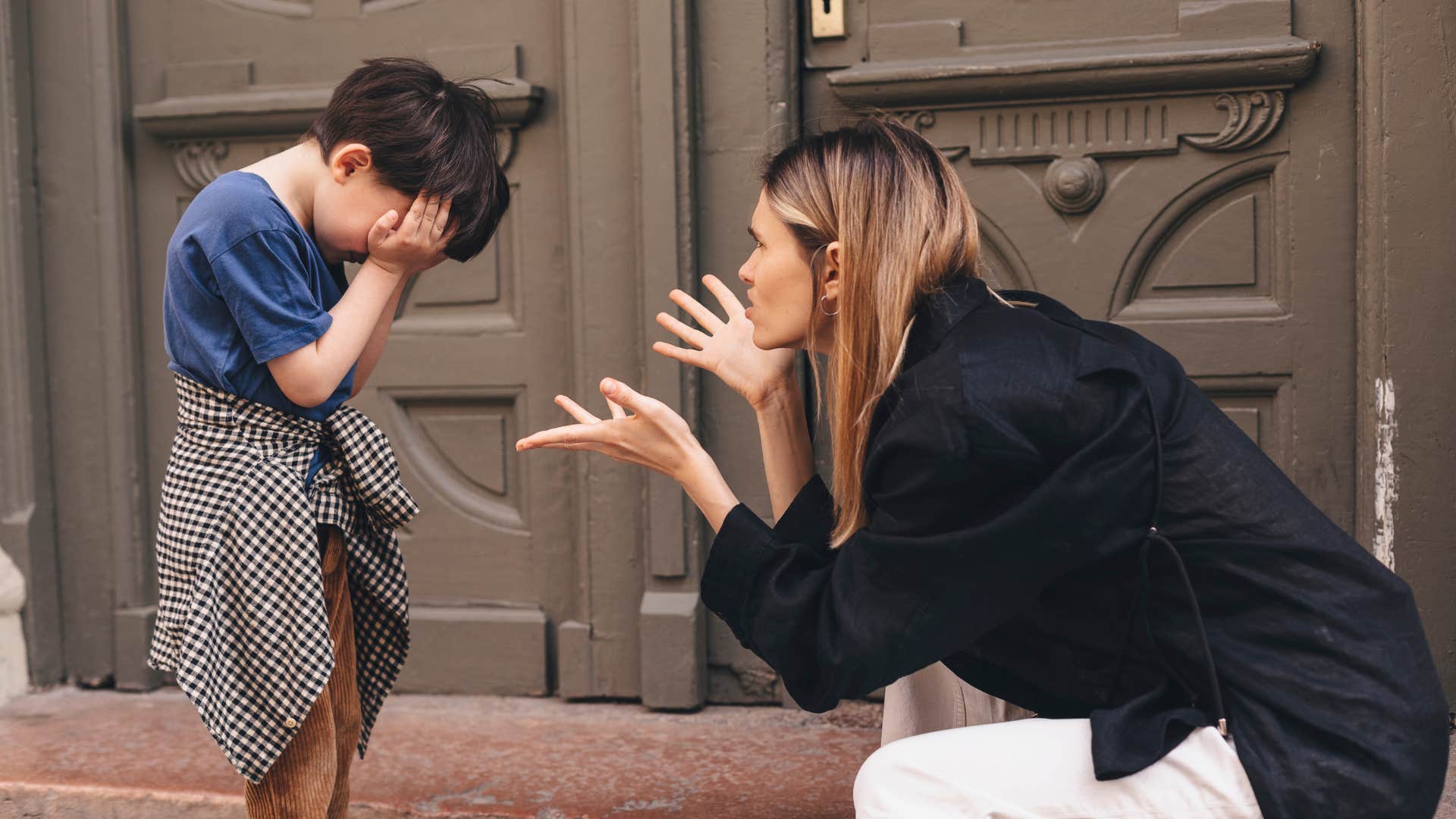 mom punishing young boy for making mistakes