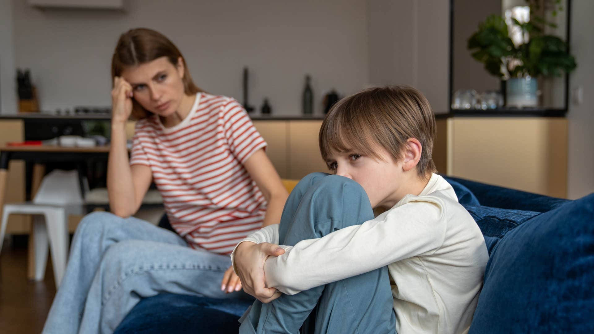 mother never praising her sad young son at home