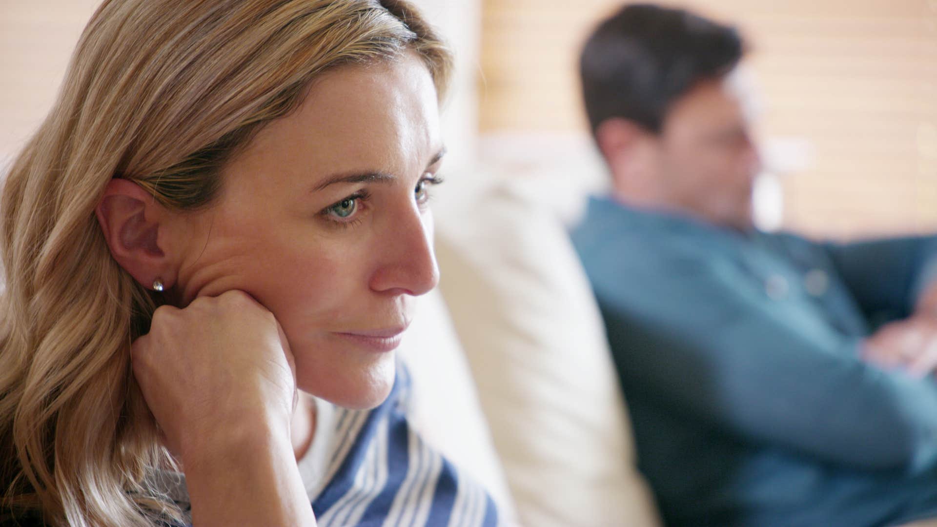 Woman sitting with a man who runs when things get tough.