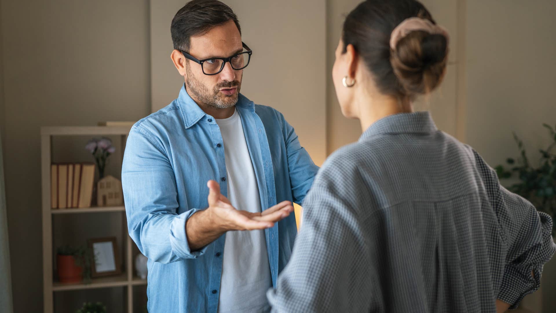 Man who tries to win arguments talking to his partner.