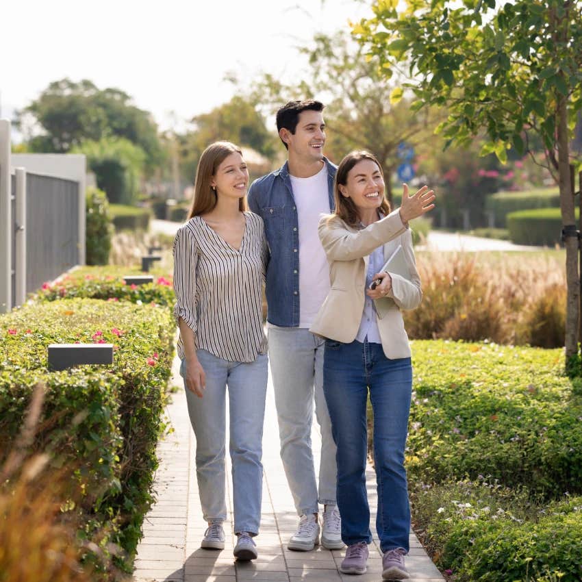 couple with realtor realizing renting is a better option than buying home