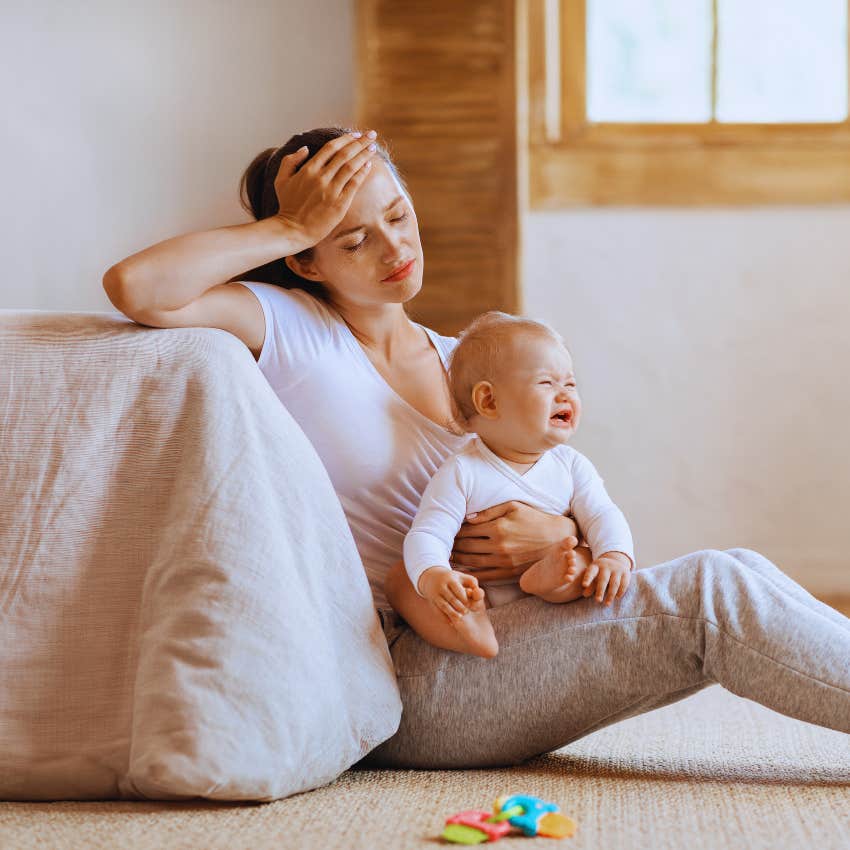 overwhelmed mom with baby