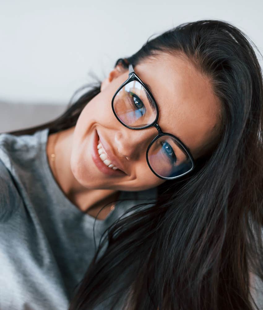 Caring person tilts head to side showing empathic trait narcissists look for