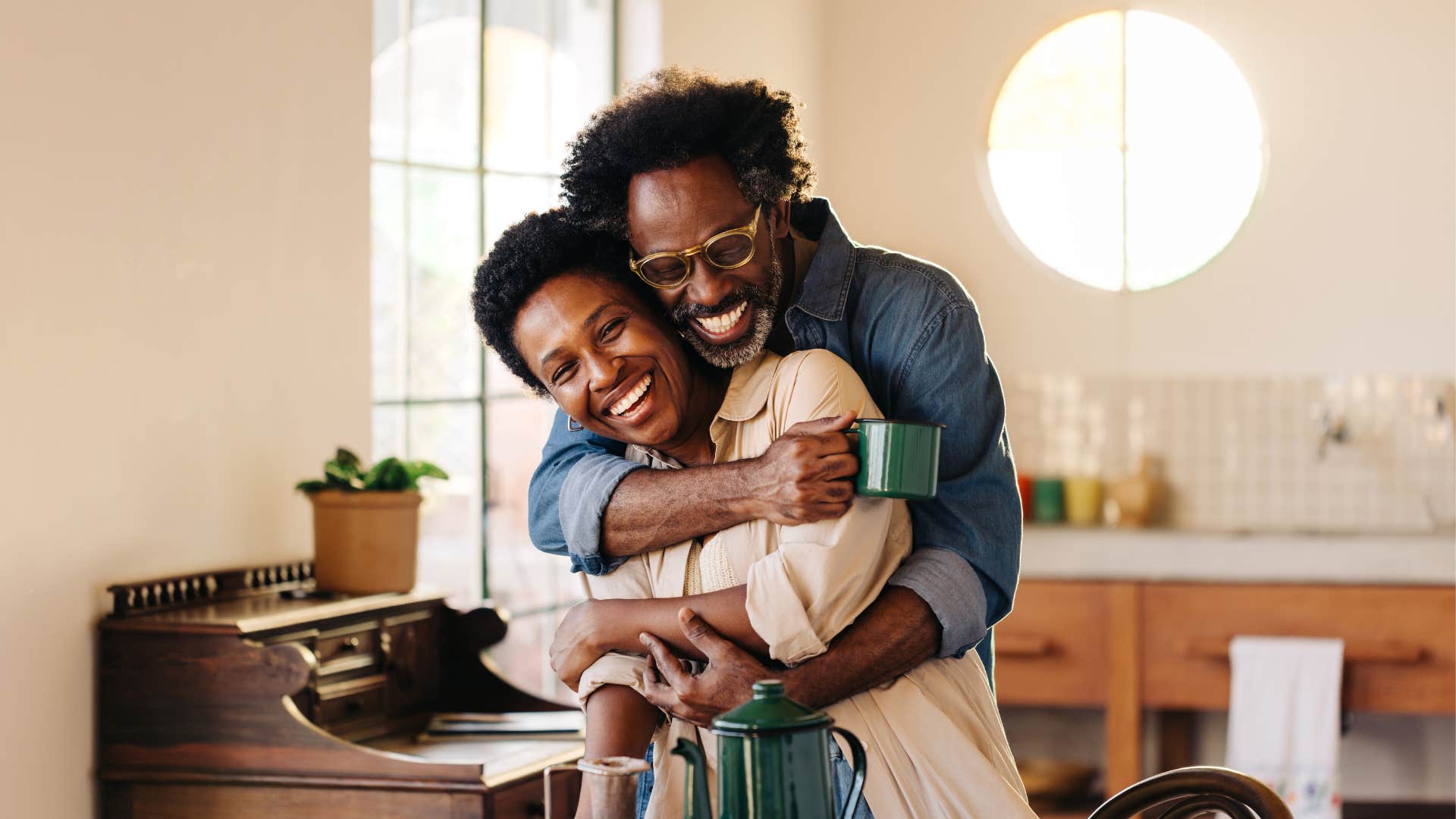 Playful couple share spontaneous hug showing way to be captivating