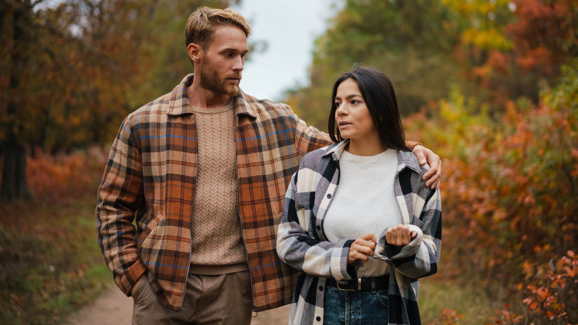 Married couple walk without phones