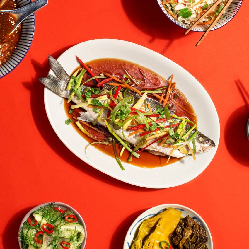 steamed whole fish traditional dish eaten night before lunar new year attract good luck